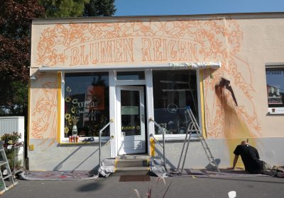 Fleurop Graffiti Fassade in Arbeit